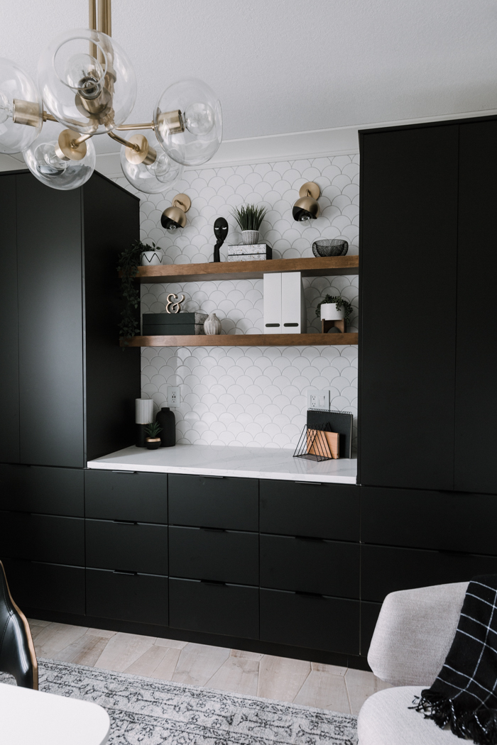 DIY-walnut-IKEA-floating-shelves-and-black-cabinets