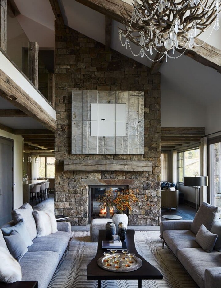 Luxury Contemporary Mountain Home Interiors high ceiling living room with exposed wood beams