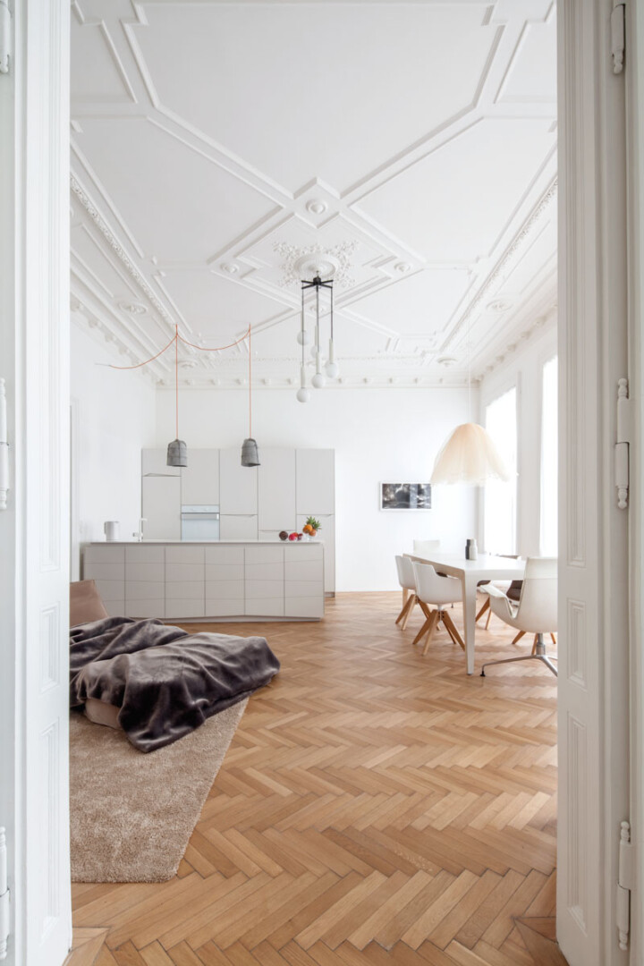 Viennese apartment with herringbone wood flooring 