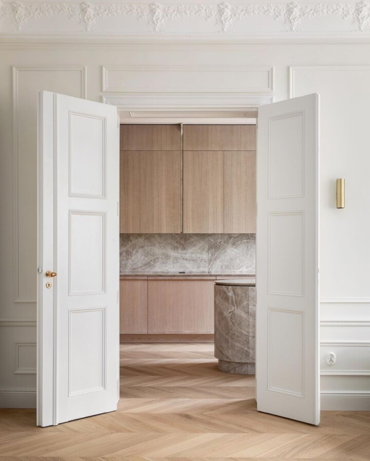 modern minimalist wood kitchen with Chevron wood flooring pattern