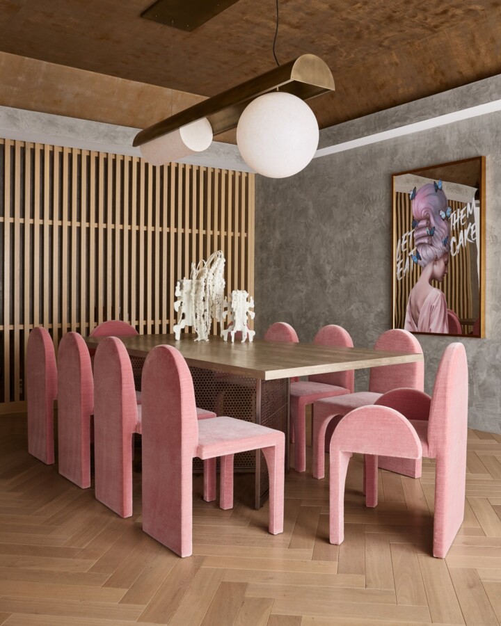 contemporary dining rooom with pink Arc chairs by Cuff Studio and Luna Light by Anna Karlin