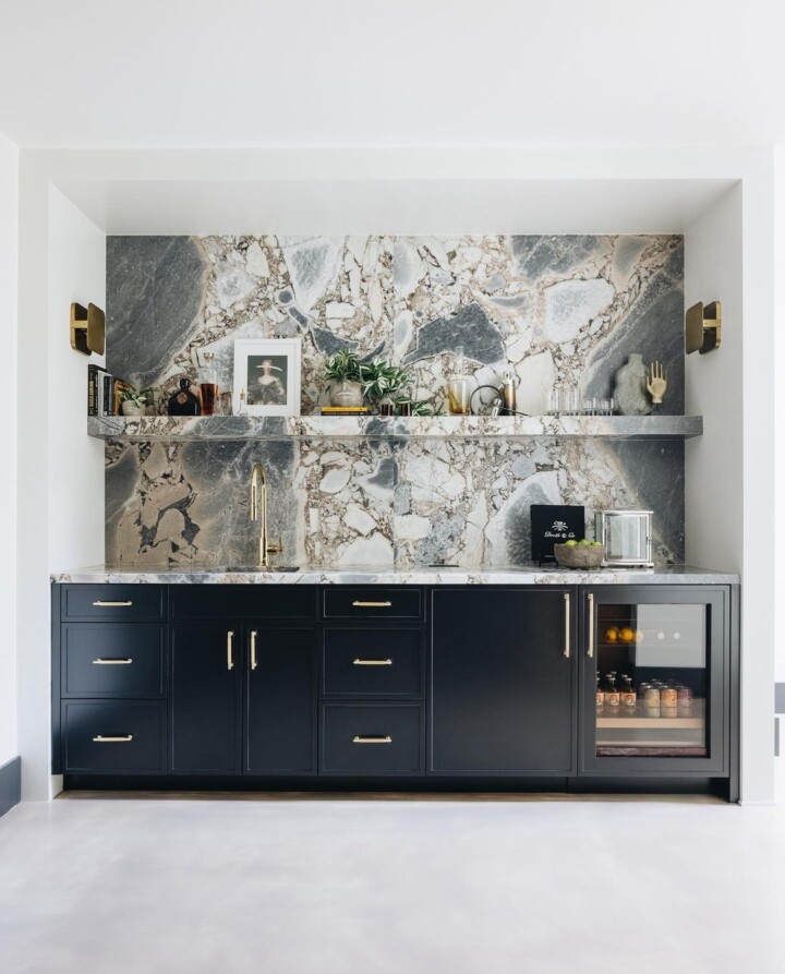 backsplash, countertop and shelf by the natural stone ocean storm