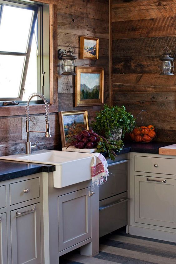 cabin-style kitchen with walls in reclaimed wood