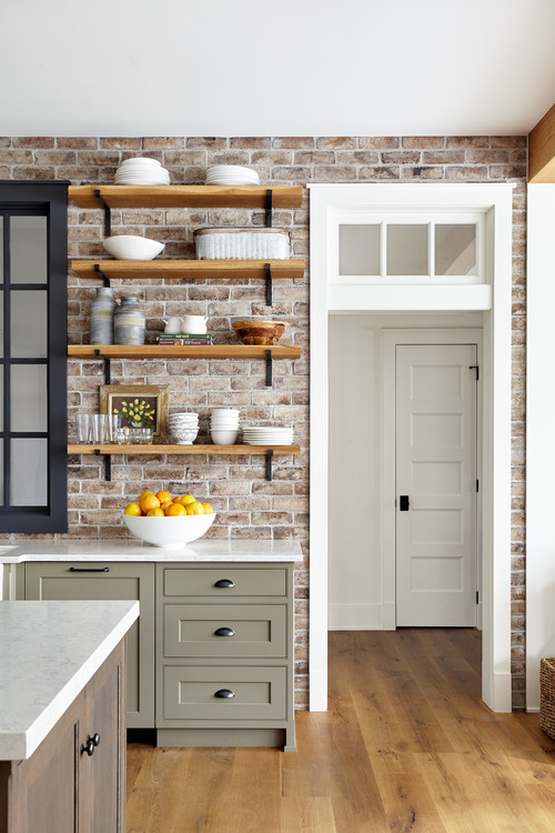 green modern Farmhouse Kitchen with Rustic White Brick Backsplash and a Shelving System