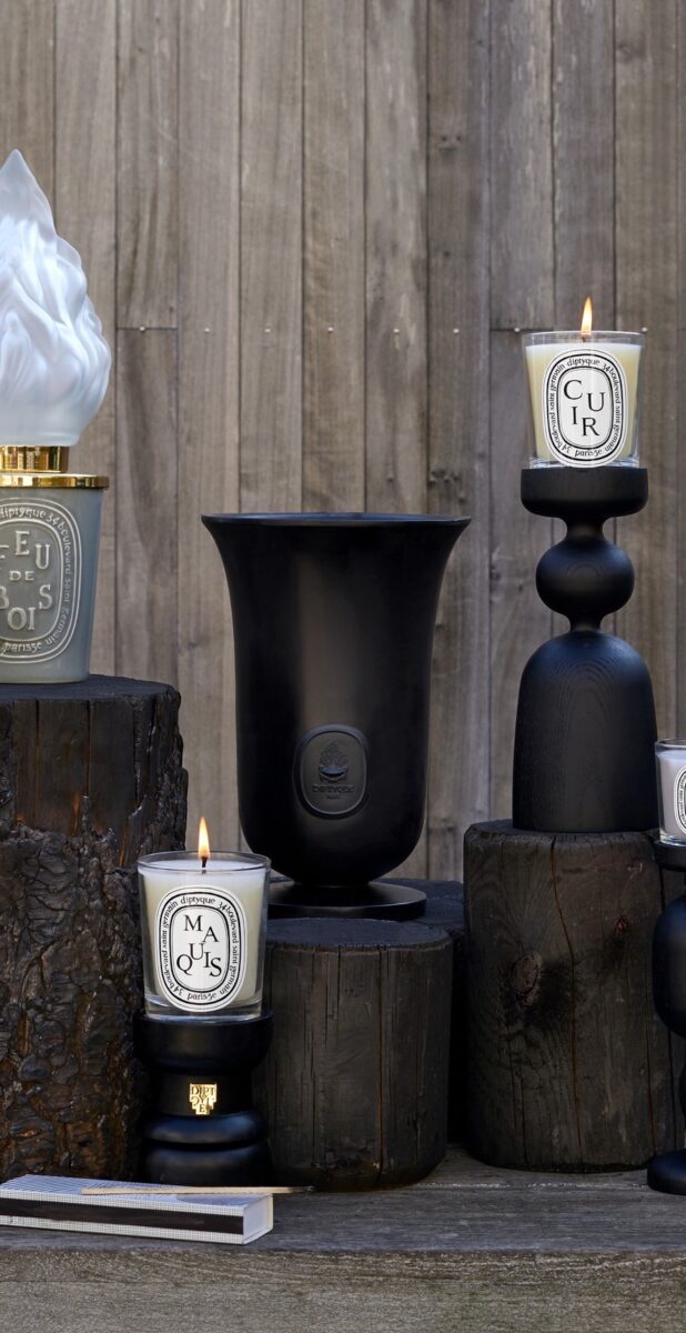 black vase and candlws