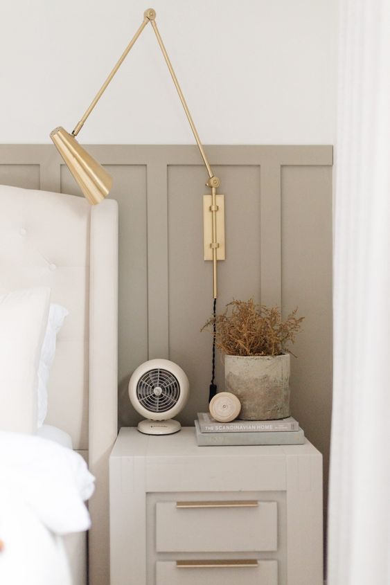 greige and ivory white bedroom with Aged Brass Plug-In Spotlight