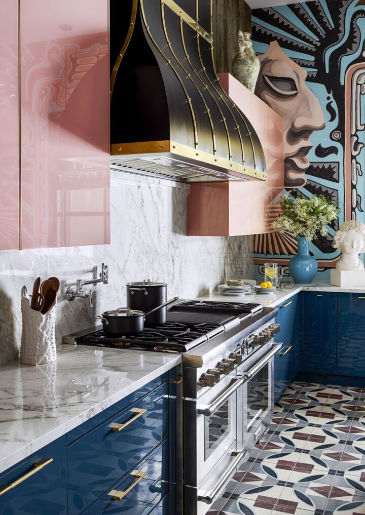 art deco colorful kitchen with wallpaper and a mix of metals