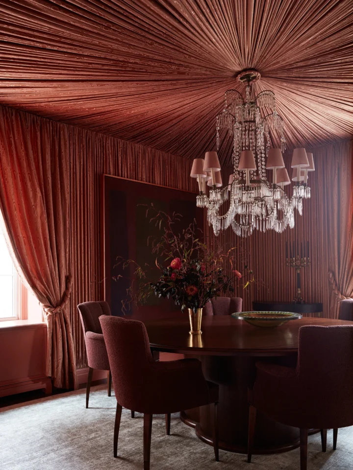 luxury rust red monochromatic dining room
