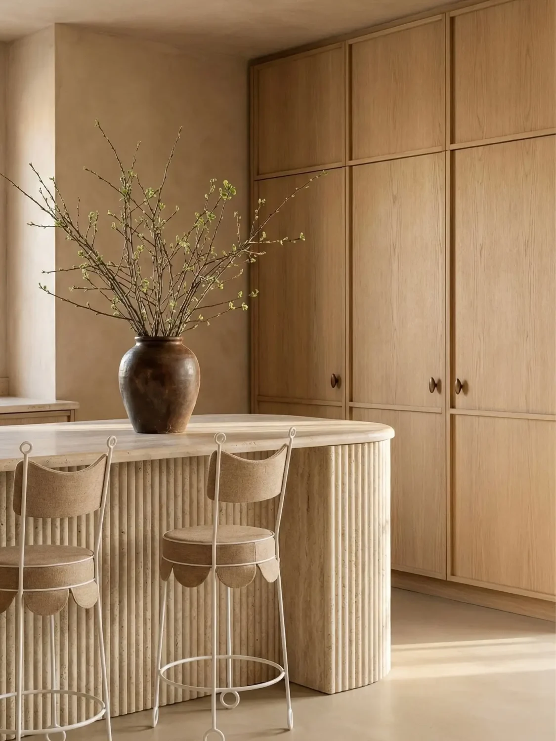 Minimal chic kitchen with clean lines, soft tones, and modern finishes