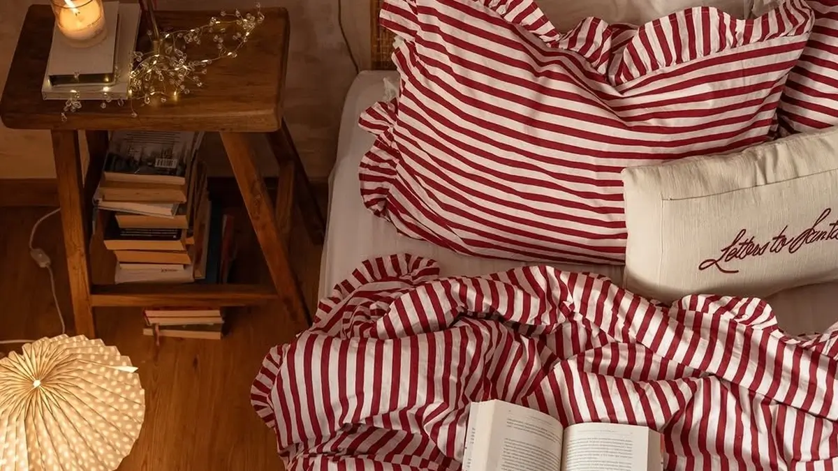 cozy-bedroom-reading-nook-striped-bedding