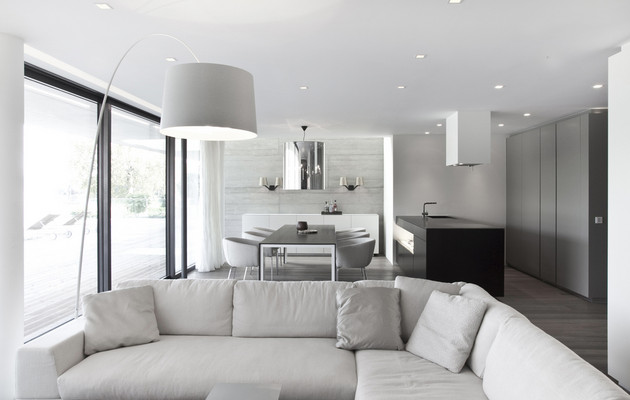 modern living room by neumann & partner