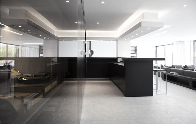 modern open plan wenge kitchen by neumann & partner